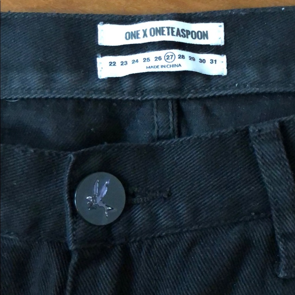 Black destroyed one teaspoon jeans